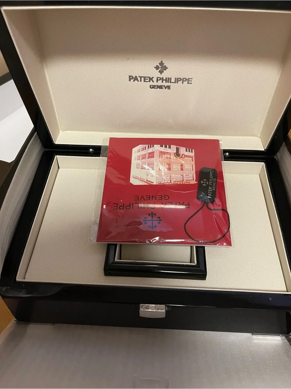 Patek Philippe Brown Wood-Pattern Watch Box with Silver Emblem